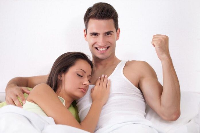 woman in bed with a man with added potency